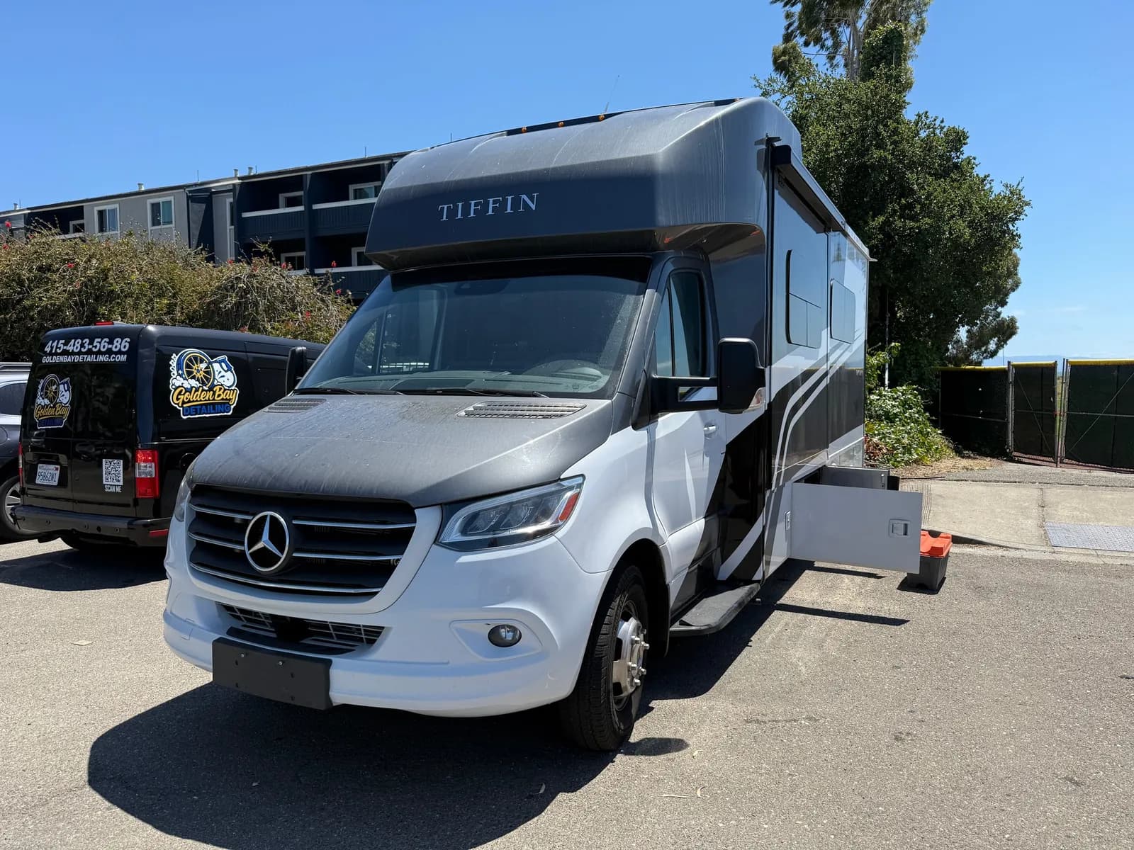 Tiffin Wayfarer motorhome covered in dust before its exterior detail
