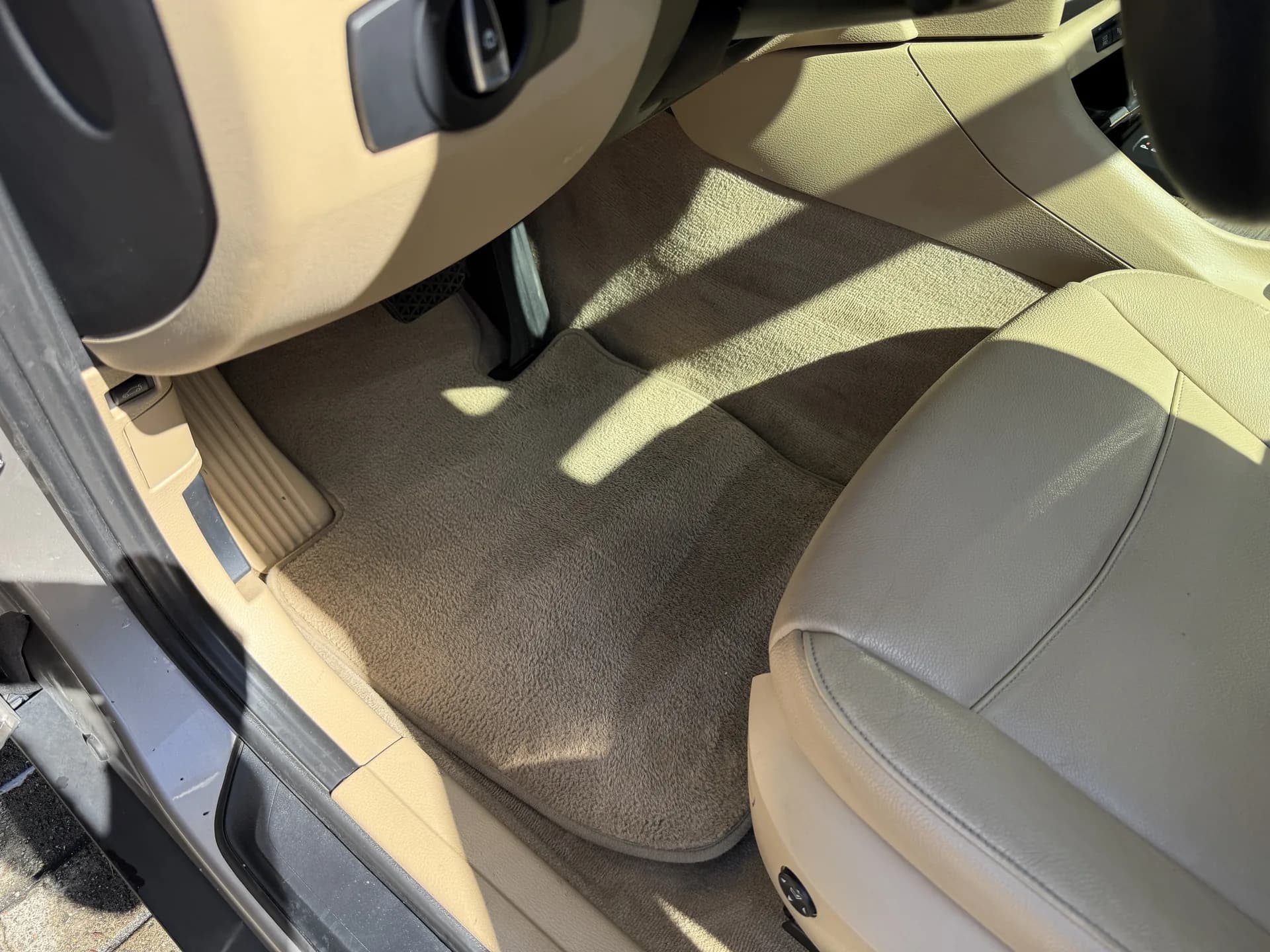 BMW 3-Series footwell carpet shampooed clean after Golden Bay's Signature Detail