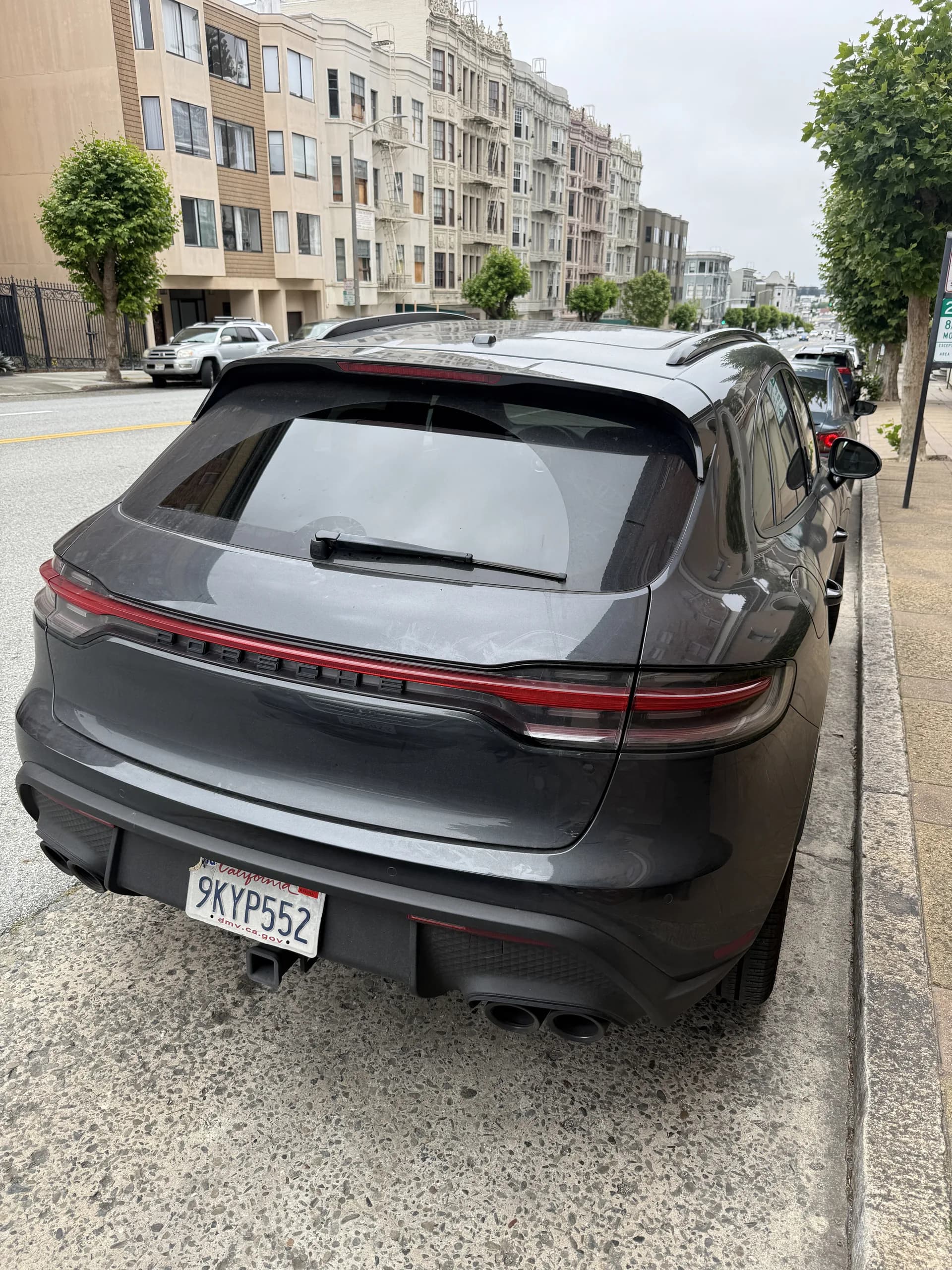 Porsche Macan paint looking dull before clay bar and machine wax in the Bay Area