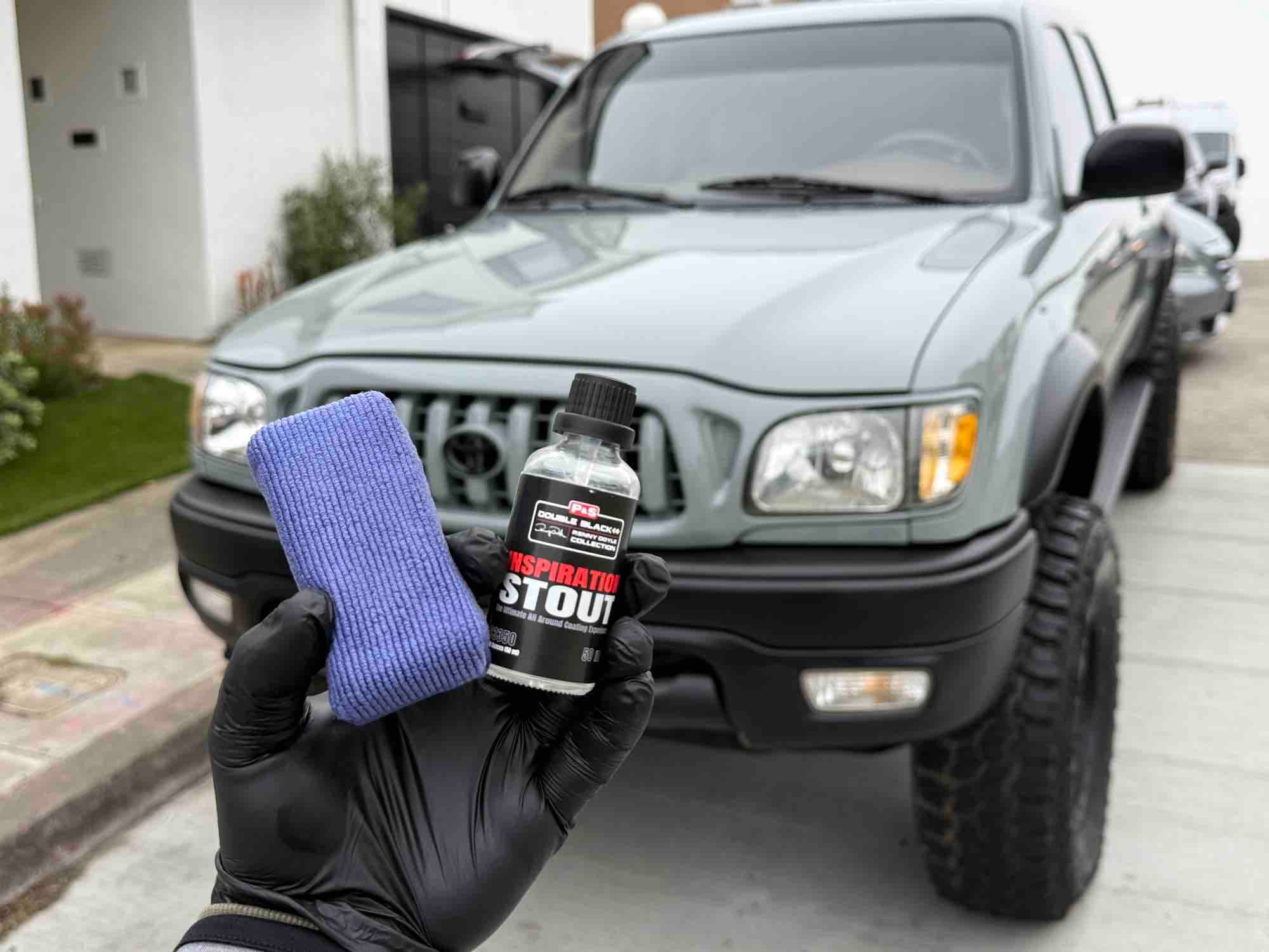 Side-by-side comparison of a car panel with clear paint protection film and a glossy ceramic-coated finish